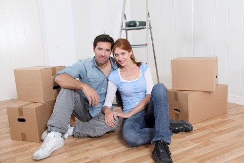 Professional movers preparing a truck for relocation